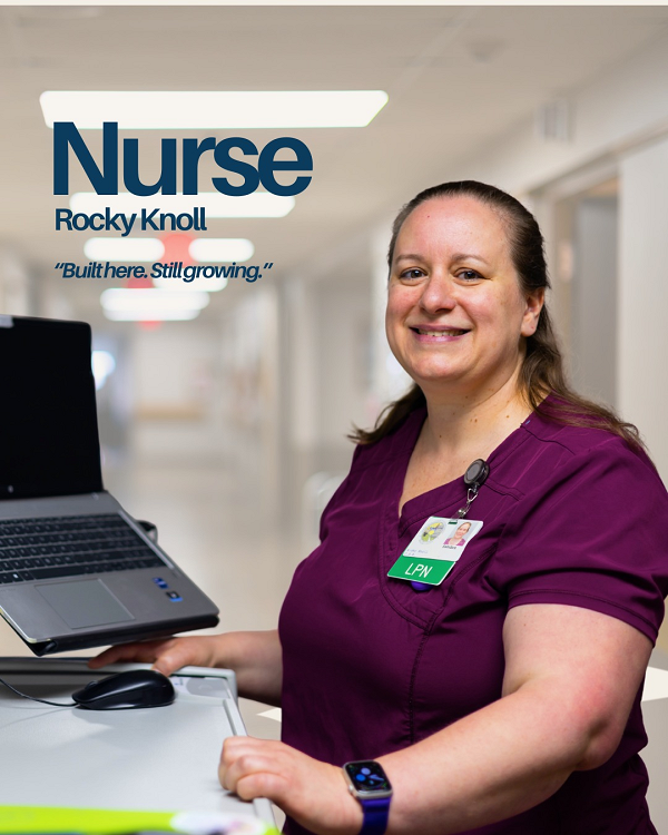 Two Rocky Knoll employees smile